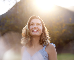 a happy woman with a beautiful smile full of optimism