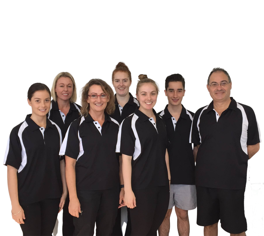 Melit Family standing together, smiling at camera